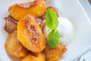 caramelized peaches with vanilla ice cream PJR8UZ8