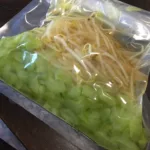 Cucumbers and bean sprouts rapidly pickled in the VacMaster VP215 vacuum chamber.