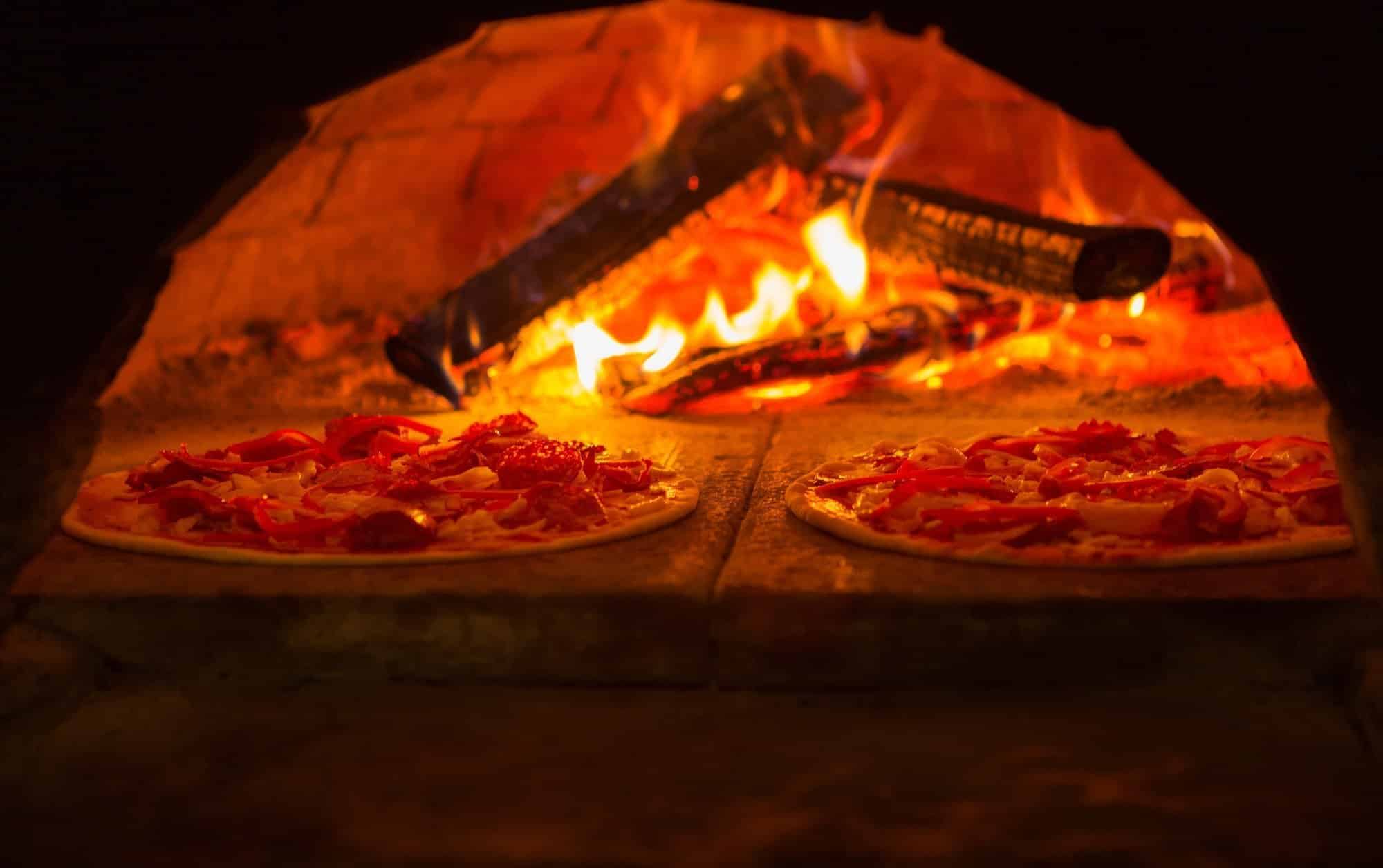 A traditional Italian wood-fired brick oven for cooking Neapolitan pizzas.