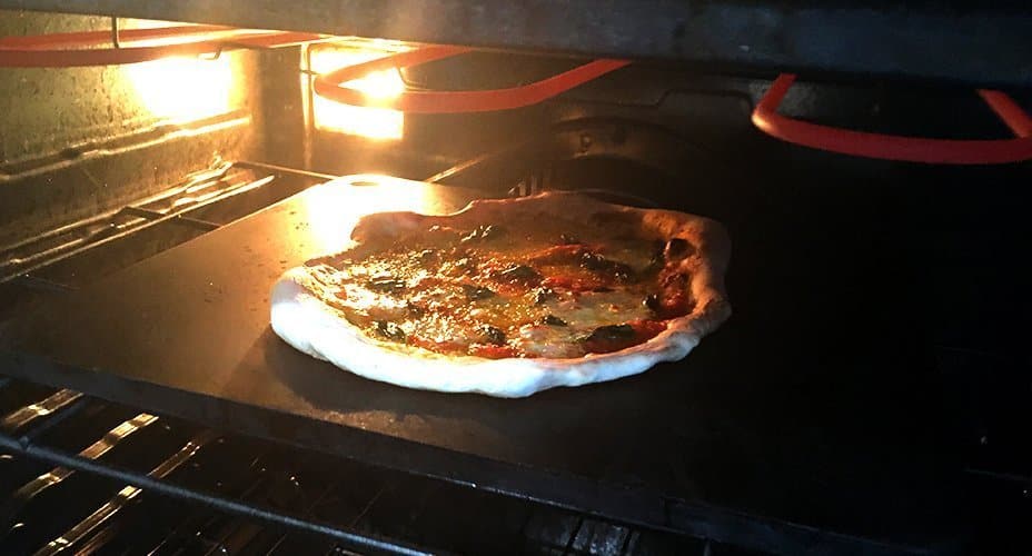 Neapolitan pizza on a NerdChef pizza stone baking steel.