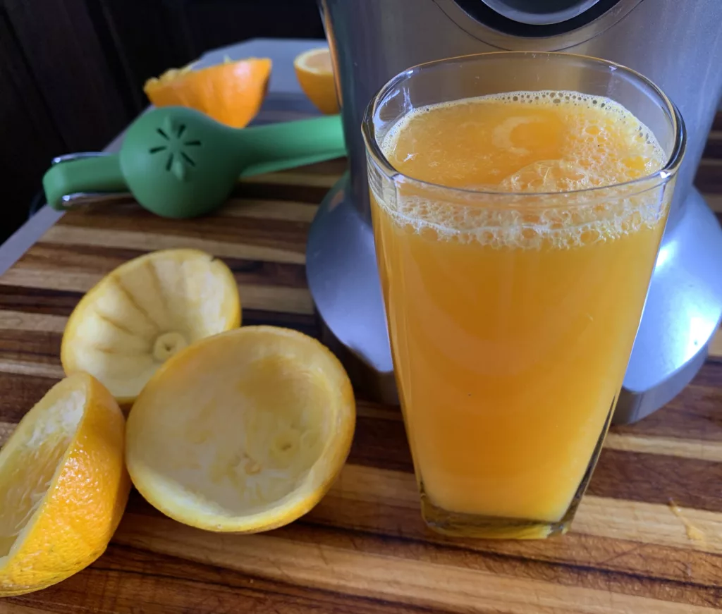 A full glass of orange juice extracted in less than a minute using our winning electric citrus juicer.