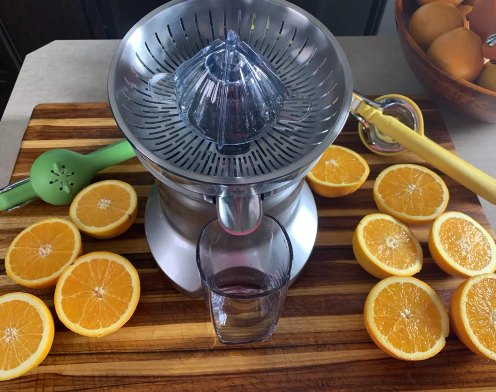 Prepare for juicing by cutting all your oranges in half prior to starting.