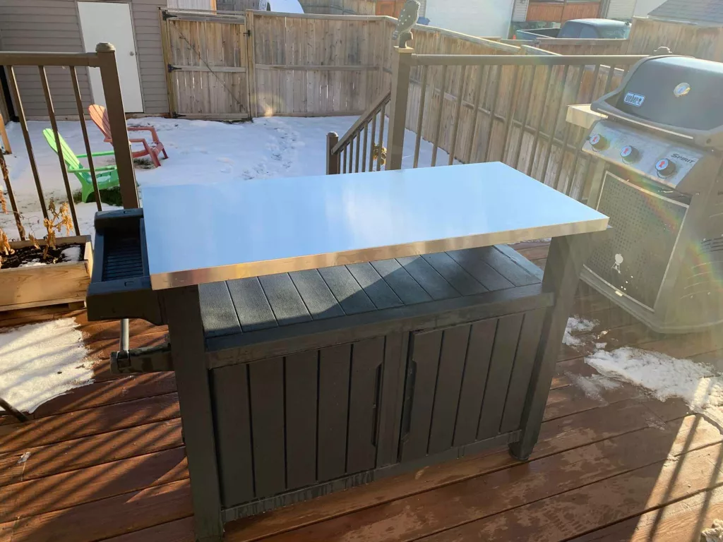 Keter xl unity outdoor countertop remains rust free even in the snow and rain.