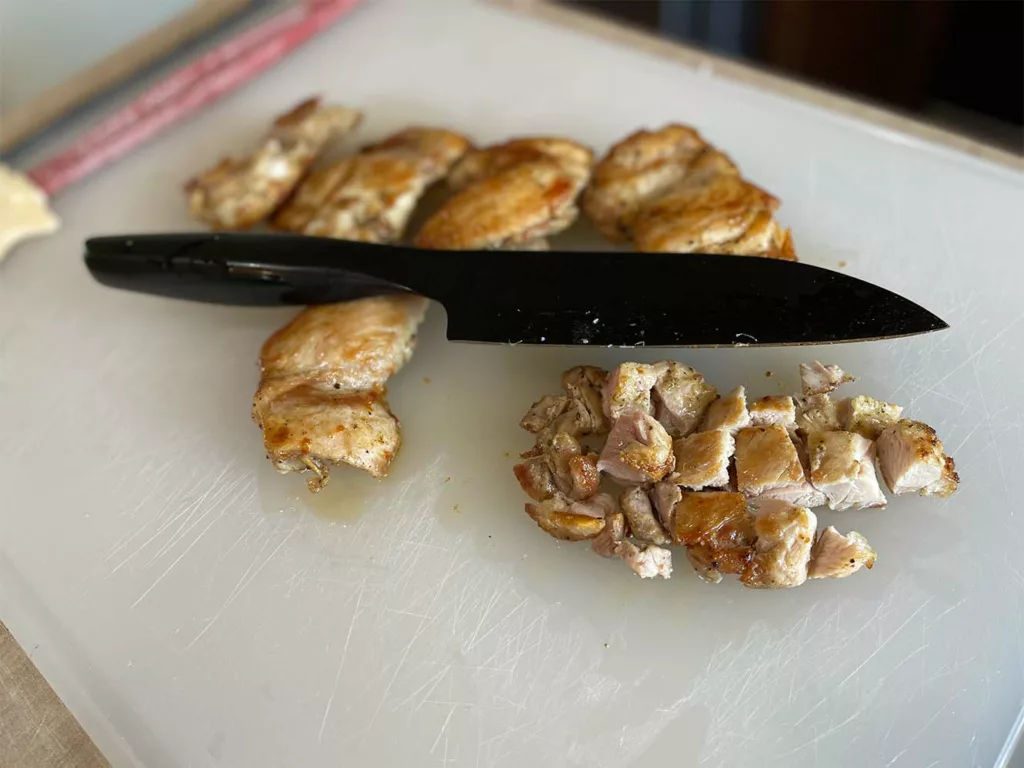 Dicing chicken with a Hast Santoku Knife.