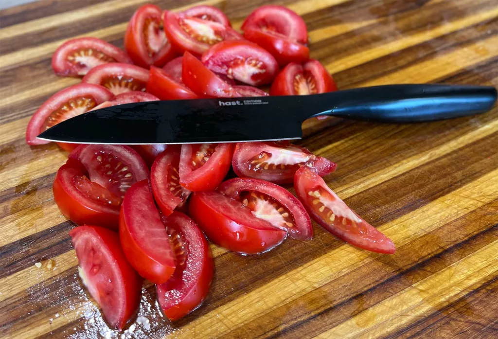 Chopped tomatoes using a Hast knife.