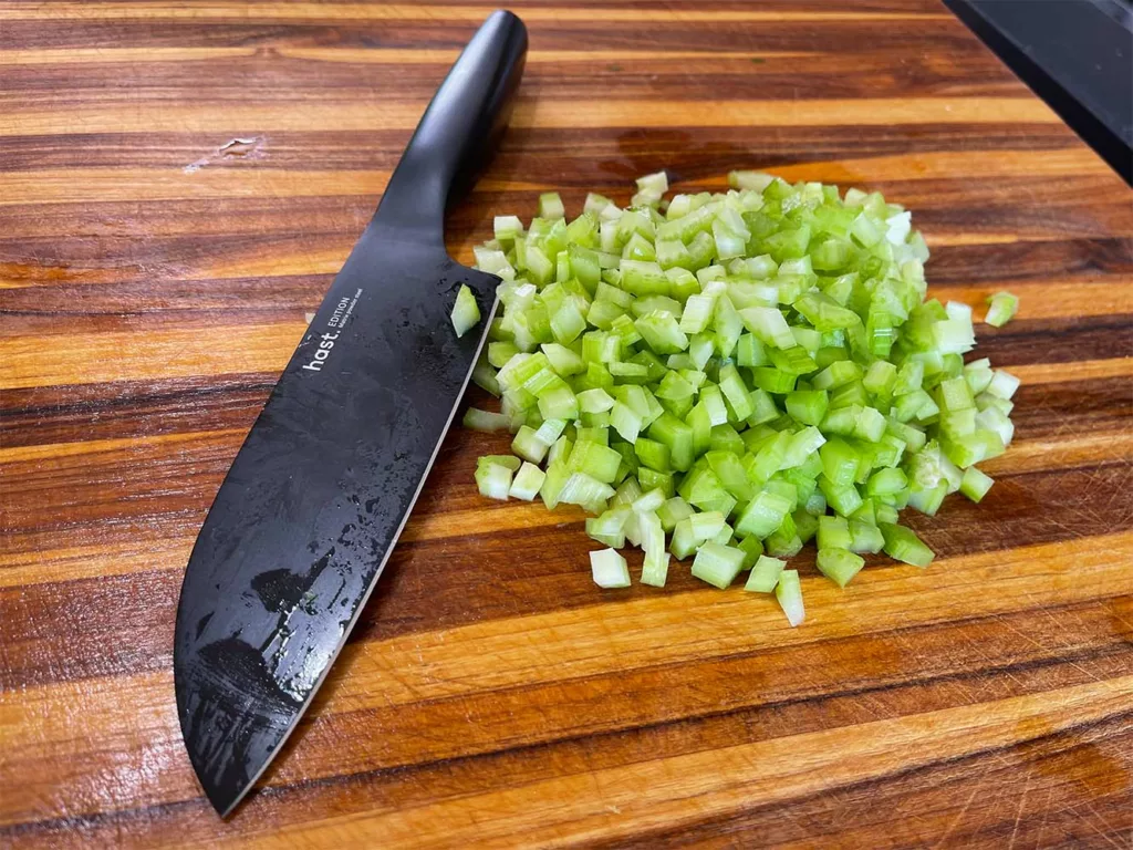 Dicing celery with a Hast knife.
