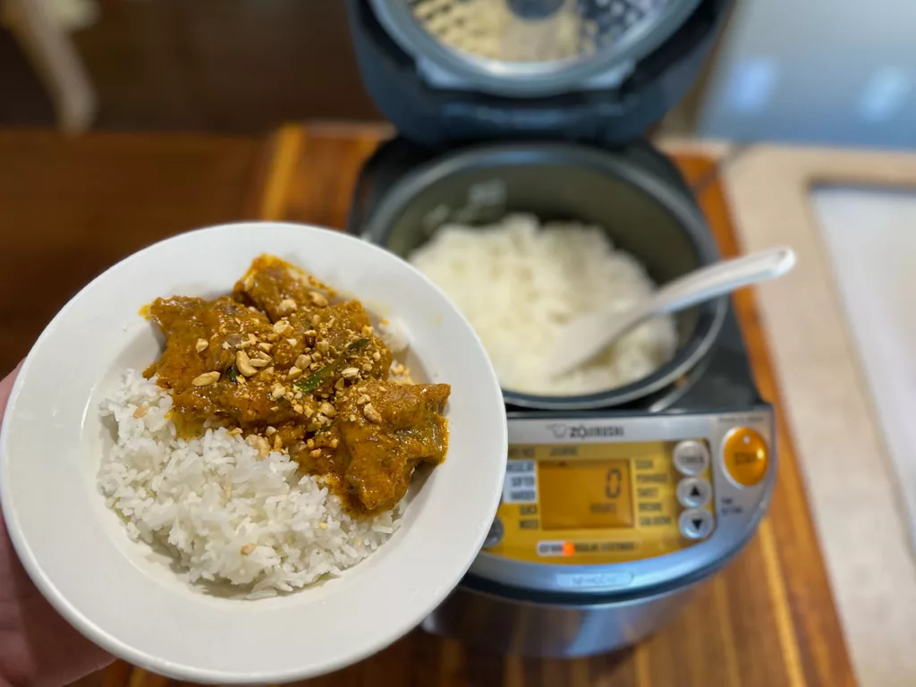Jasmine rice made in Zojirushi induction rice cooker, paired with panang beef curry.