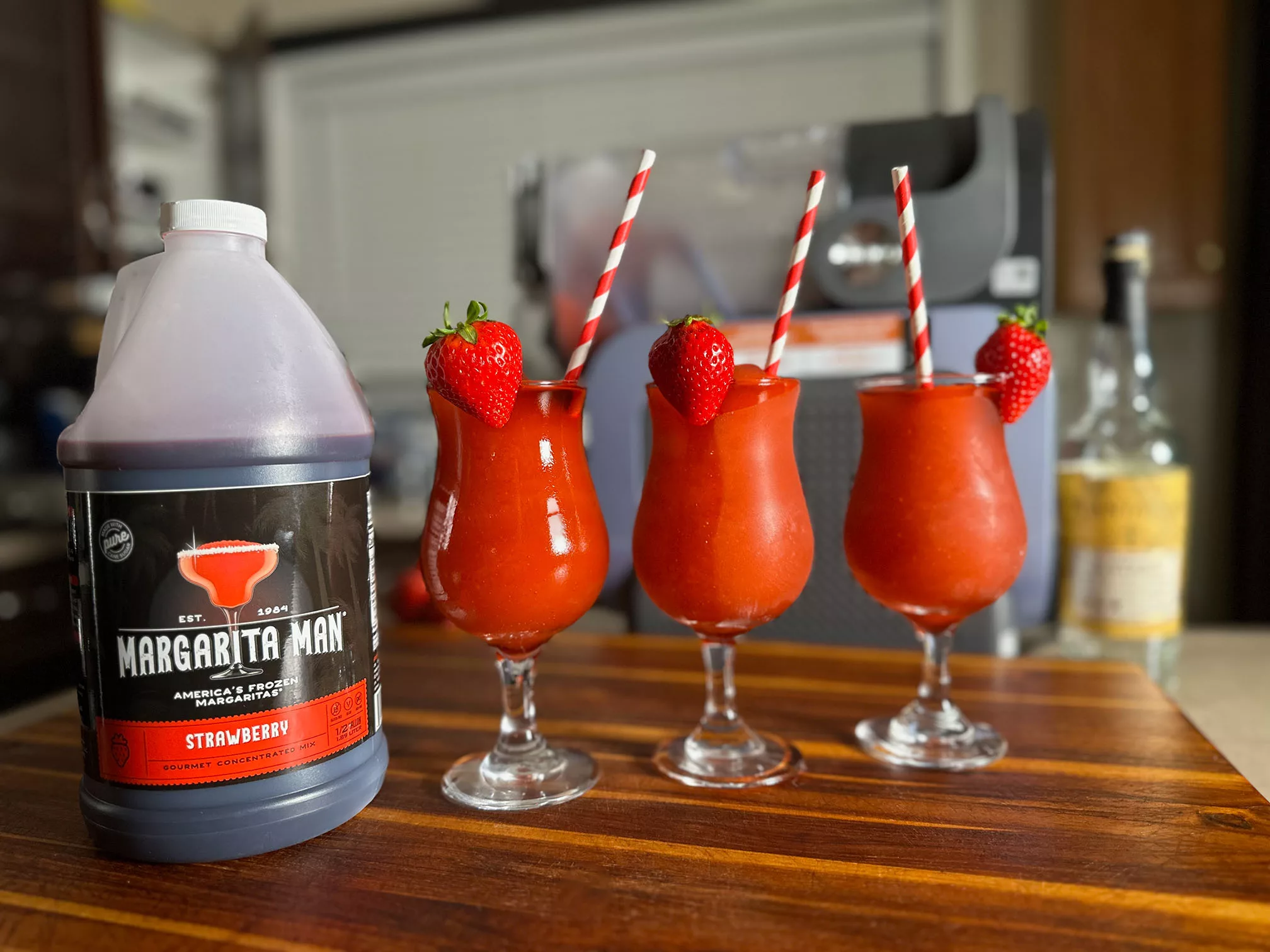 Strawberry daiquiris made with the Ninja SLUSHi and Margarita Man mix.