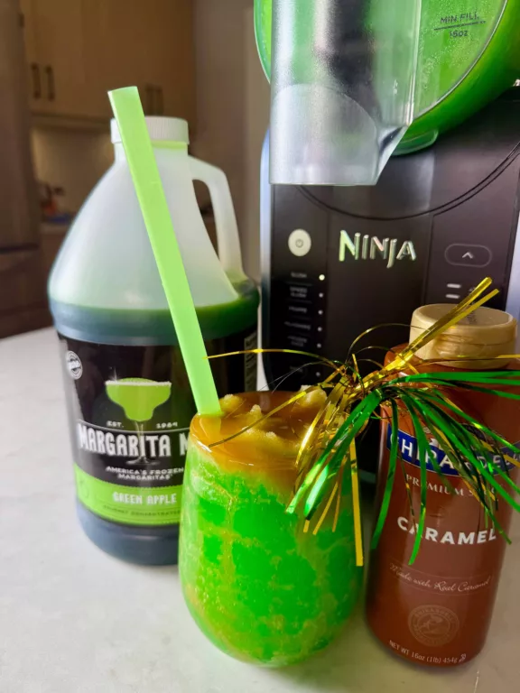 Candy Apple slushy made in the Ninja SLUSHi with Margarita Man mix.